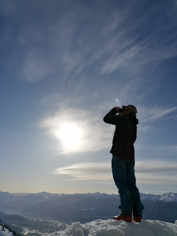 Anselm Köhler (BFW) looking for the deposition area of the avalanche and the AvaNode.